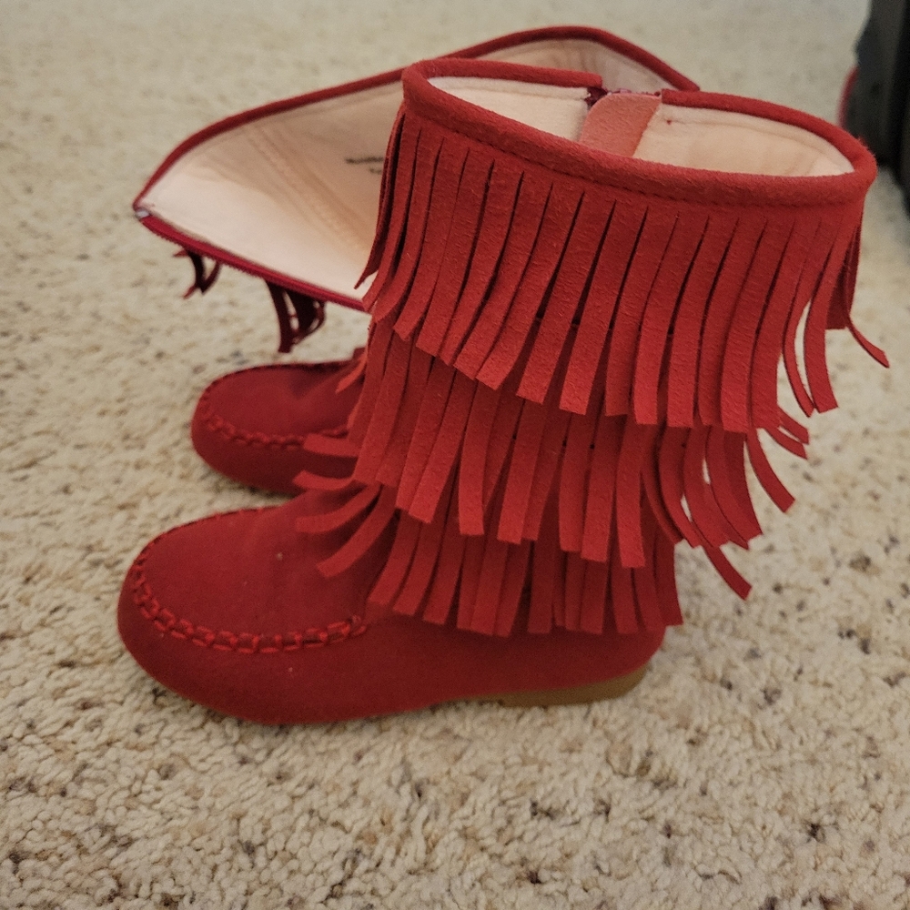 Red kids boots with tassels